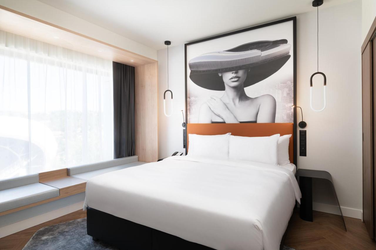 Radisson Blu Hotel, Cluj Exterior foto A bedroom at the hotel